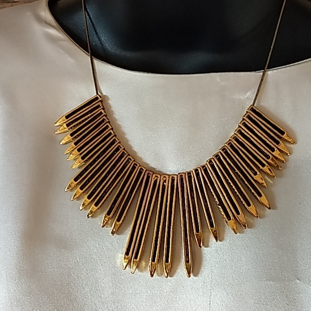 Black and gold tone bib necklace
